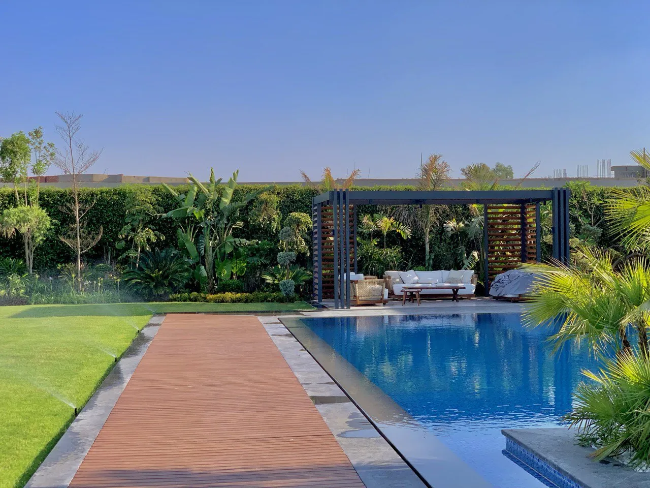 Pergola with garden and pool